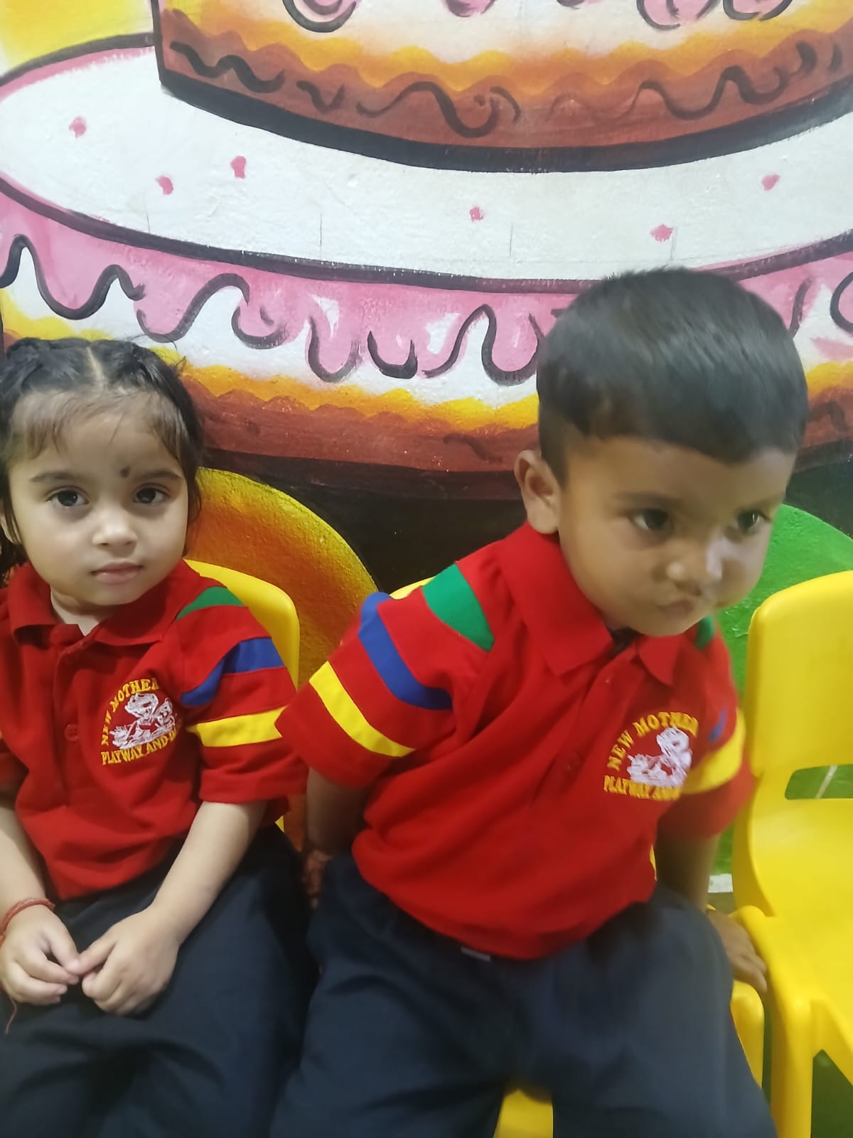 Children in school uniform smiling together