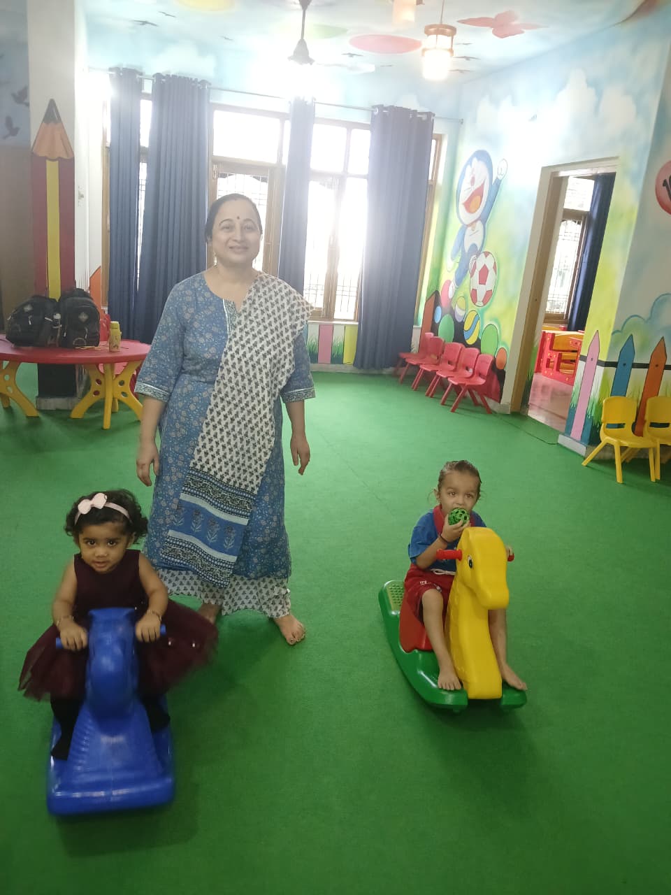 Play equipment including ride-on toys for children